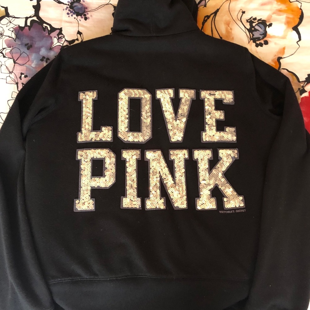 Pink fur lined sweatshirt coat.